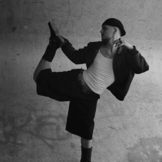 This photo shows teacher Mathieu, in black-and-white, moving